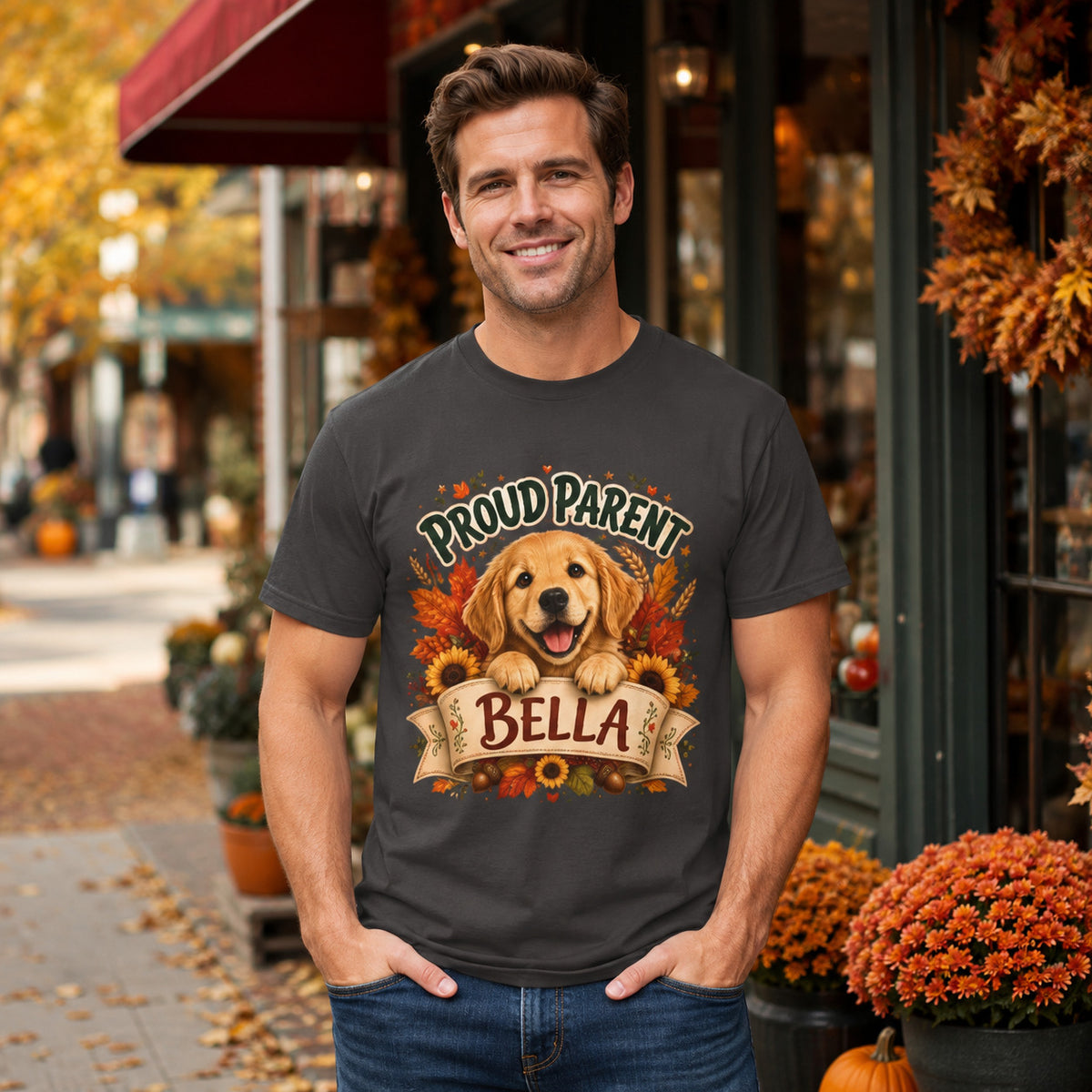 Model wearing a graphite Proud Parent Bella t-shirt with a Golden Retriever in a lifestyle scene
