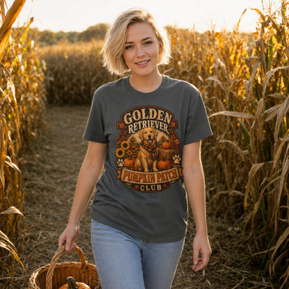 Model wearing a pepper Golden Retriever Pumpkin Patch t-shirt with a Golden Retriever at a pumpkin patch