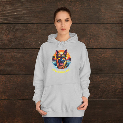 Woman modeling a heather grey unisex college hoodie with vibrant dog lover graphic and “Stay Pawsitive in Style” text.