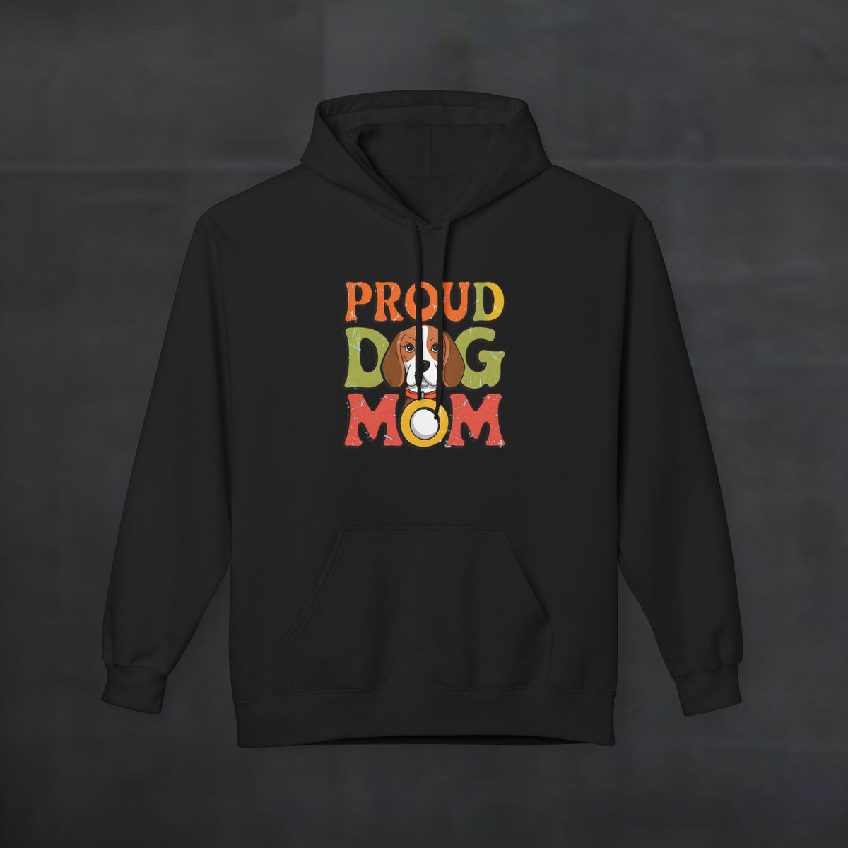 Black hoodie mockup featuring colorful “Proud Dog Mom” text design, cozy dog lover pullover hoodie with vibrant retro typography on a dark background.