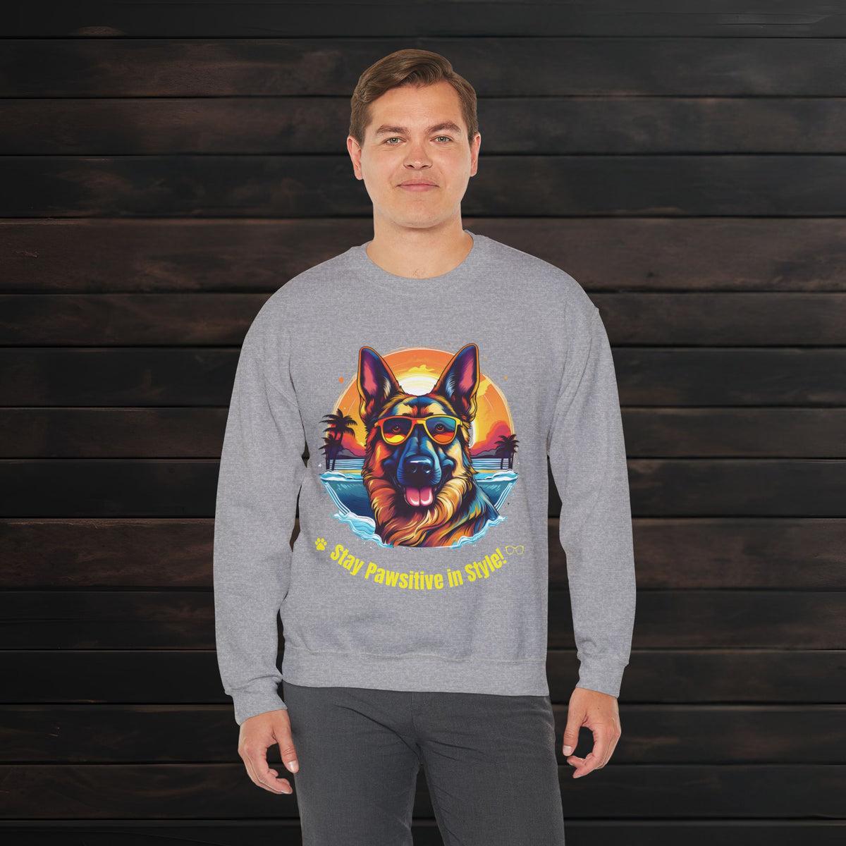 Man modeling a sport grey unisex heavy blend crewneck sweatshirt with detailed German Shepherd artwork and comfortable everyday fit.