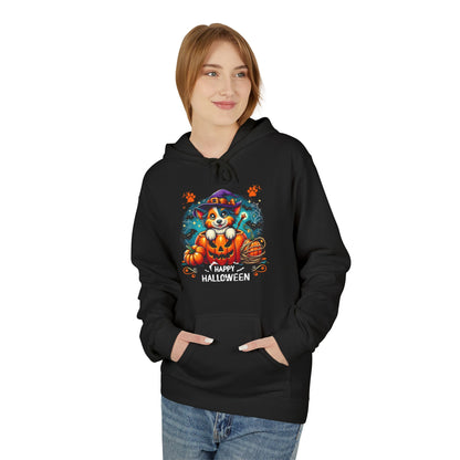 Woman wearing a black Halloween hoodie featuring a cute puppy in a witch hat sitting inside a glowing jack-o’-lantern with pumpkins, paw prints, and “Happy Halloween” text, festive dog lover hoodie mockup on light background.
