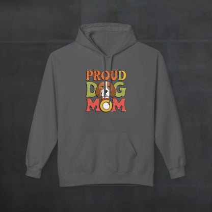 Charcoal black hoodie mockup featuring colorful “Proud Dog Mom” text design, stylish dog lover hoodie with bold multicolor typography on dark background.