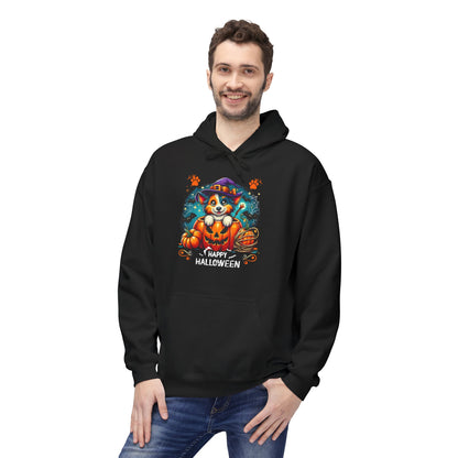 Man wearing a black Halloween hoodie featuring a cute puppy in a witch hat sitting inside a glowing jack-o’-lantern with pumpkins, paw prints, and “Happy Halloween” text, festive dog lover hoodie mockup on light background.