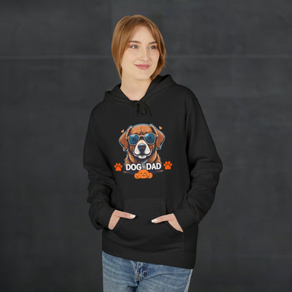 Woman wearing a black “Dog Dad” hoodie featuring a colorful dog face graphic, cozy casual dog lover apparel with modern autumn fashion style.