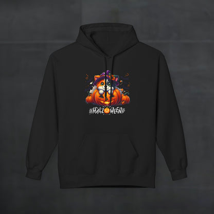 Black Halloween hoodie featuring a cute puppy in a witch hat peeking out of a glowing jack-o’-lantern with pumpkins and spooky Halloween text, cozy dog lover hoodie mockup on dark background.