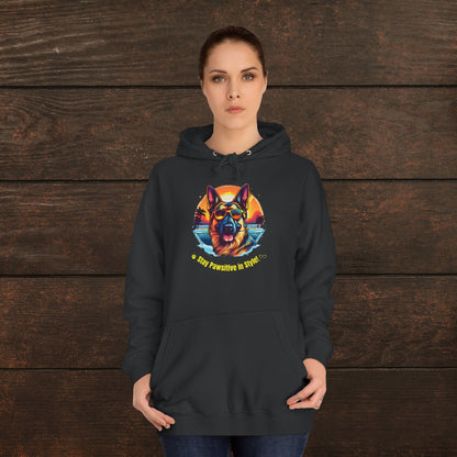 Woman modeling a jet black unisex college hoodie with colorful dog lover artwork and retro-inspired “Stay Pawsitive in Style” design.