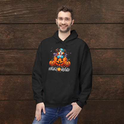 Man wearing a black Halloween hoodie featuring a cute spooky puppy inside a glowing jack-o’-lantern with pumpkins and “Halloween” text, festive dog lover hoodie mockup on rustic wooden background for fall apparel listing.