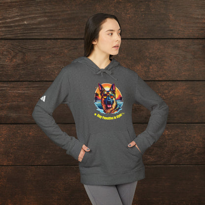 Woman posing in a dark grey heather adidas unisex fleece hoodie featuring colorful German Shepherd graphic and retro dog lover artwork.