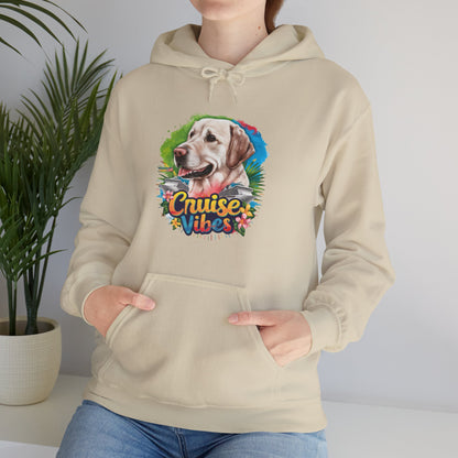 Woman modeling a sand unisex heavy blend hooded sweatshirt with vibrant Labrador “Cruise Vibes” graphic and cozy casual fit.