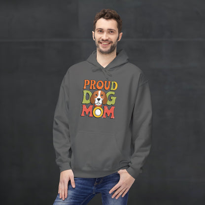 Man wearing a charcoal black “Proud Dog Mom” hoodie featuring vibrant retro text design, comfortable dog lover hoodie mockup with casual fashion style.