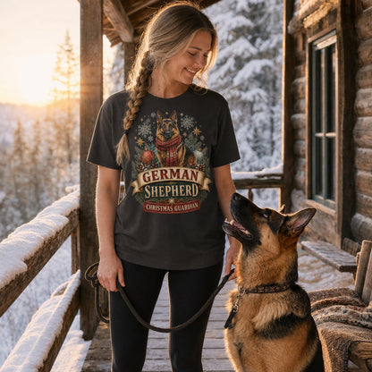 Model wearing a graphite Christmas Guardian t-shirt with a German Shepherd in a Christmas scene