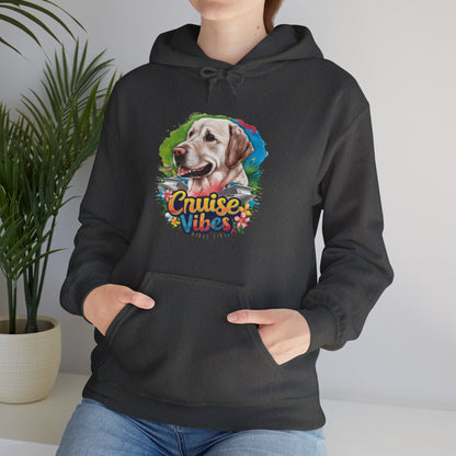 Woman modeling a charcoal unisex heavy blend hooded sweatshirt with playful Labrador graphic and colorful cruise-inspired design.
