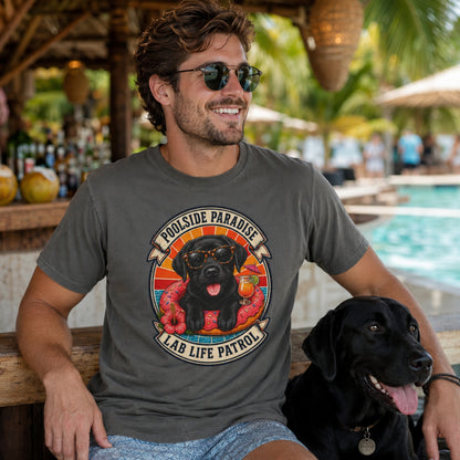 Model wearing a pepper Poolside Paradise t-shirt with a Black Labrador puppy on a pool float