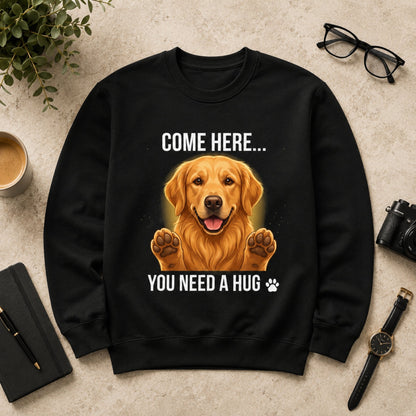 Flat lay mock-up of a black Golden Retriever sweatshirt with “Come Here You Need a Hug” text on a light background.