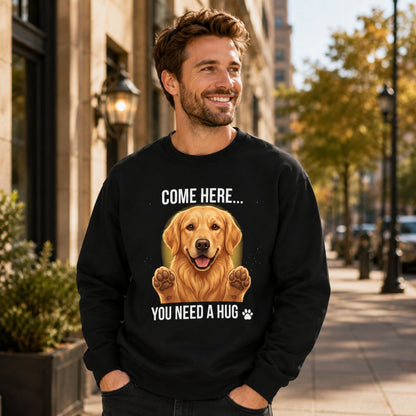 Man wearing a black Golden Retriever sweatshirt with a cute dog hug design in an outdoor lifestyle setting.
