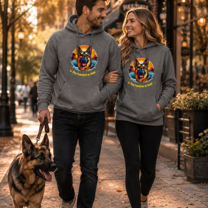 Couple wearing charcoal Stay Pawsitive in Style German Shepherd hoodie while walking together outdoors in autumn.