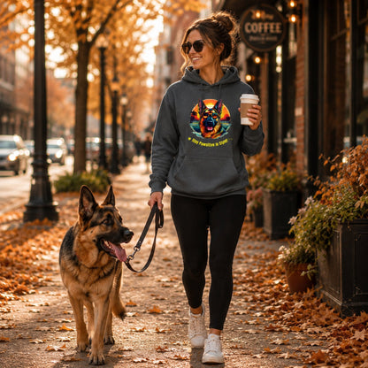 Woman wearing charcoal Stay Pawsitive in Style German Shepherd hoodie while walking with her dog.