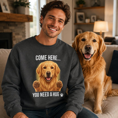 Man wearing a dark heather Golden Retriever sweatshirt while sitting at home with a real Golden Retriever dog.