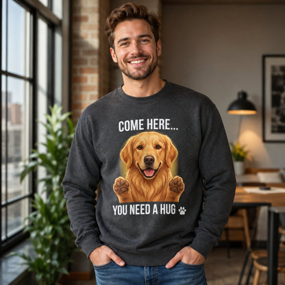 Man wearing a dark heather dog lover sweatshirt featuring a Golden Retriever hug design in an indoor lifestyle setting.