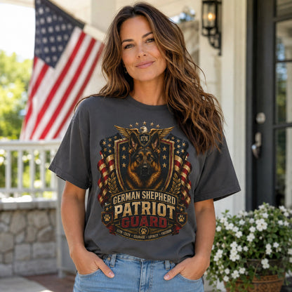 Woman wearing a graphite German Shepherd Patriot Guard T-shirt with a German Shepherd patriotic crest design in a porch lifestyle scene.