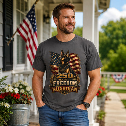 Man wearing a graphite “250 Years Freedom Guardian” T-shirt near a garden porch with patriotic decor.