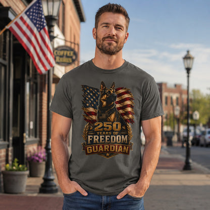 Man wearing a pepper “250 Years Freedom Guardian” T-shirt on a downtown street with patriotic flags.