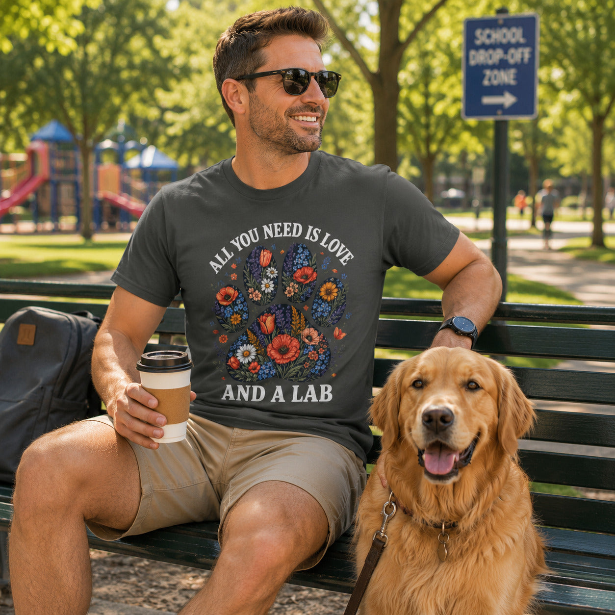 Man sitting on a bench with his Labrador, wearing pepper 'All You Need Is Love And A Lab' t-shirt