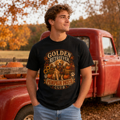 Model wearing a black Golden Retriever Pumpkin Patch t-shirt with a Golden Retriever at a pumpkin patch