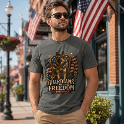 Man wearing a pepper Guardians of Freedom K-9 T-shirt with a German Shepherd patriotic graphic in an urban street scene with American flags.