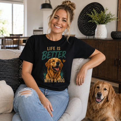 Woman wearing a black Life Is Better With A Dog T-shirt while sitting in a living room with a golden retriever.