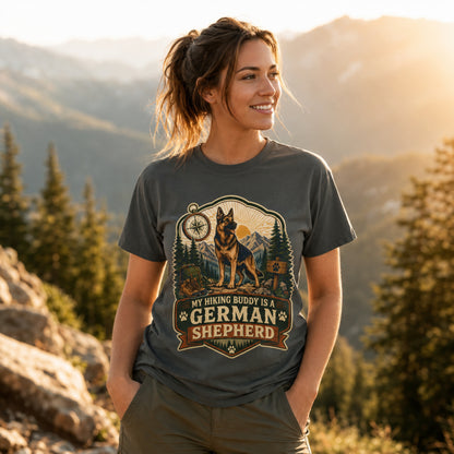 Woman wearing a pepper My Hiking Buddy German Shepherd T-shirt near a mountain overlook.