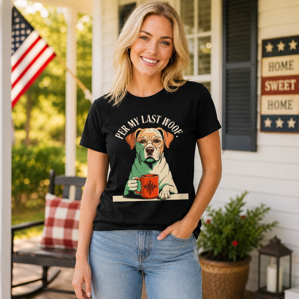 Woman standing on a porch with American flag decor, wearing black colorful Labrador coffee t-shirt