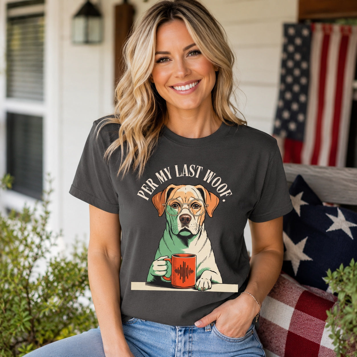 Woman standing on a porch with patriotic decor, wearing graphite colorful Labrador coffee t-shirt