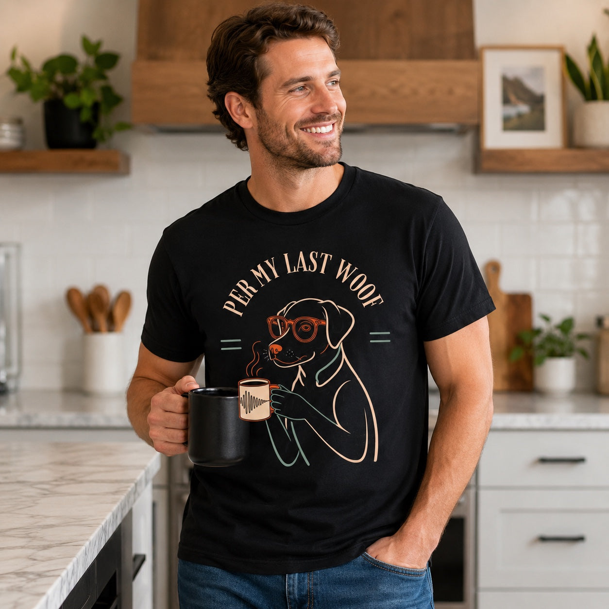 Man standing in a kitchen holding a mug, wearing black 'Per My Last Woof' dog t-shirt
