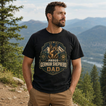 Man wearing a black Proud German Shepherd Dad T-shirt on a mountain trail.