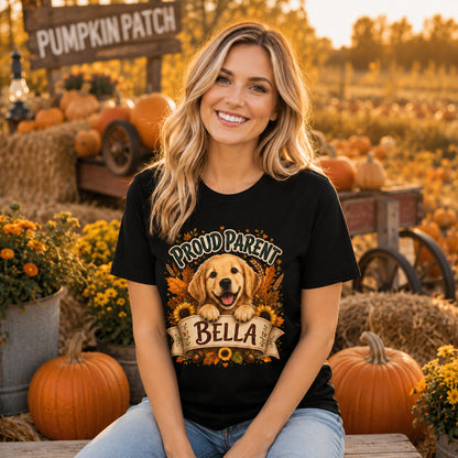 Model wearing a black Proud Parent Bella t-shirt with a Golden Retriever in a lifestyle scene