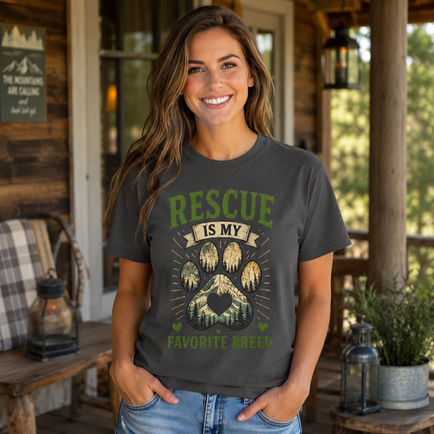 Woman wearing a graphite Rescue Is My Favorite Breed T-shirt on a front porch.