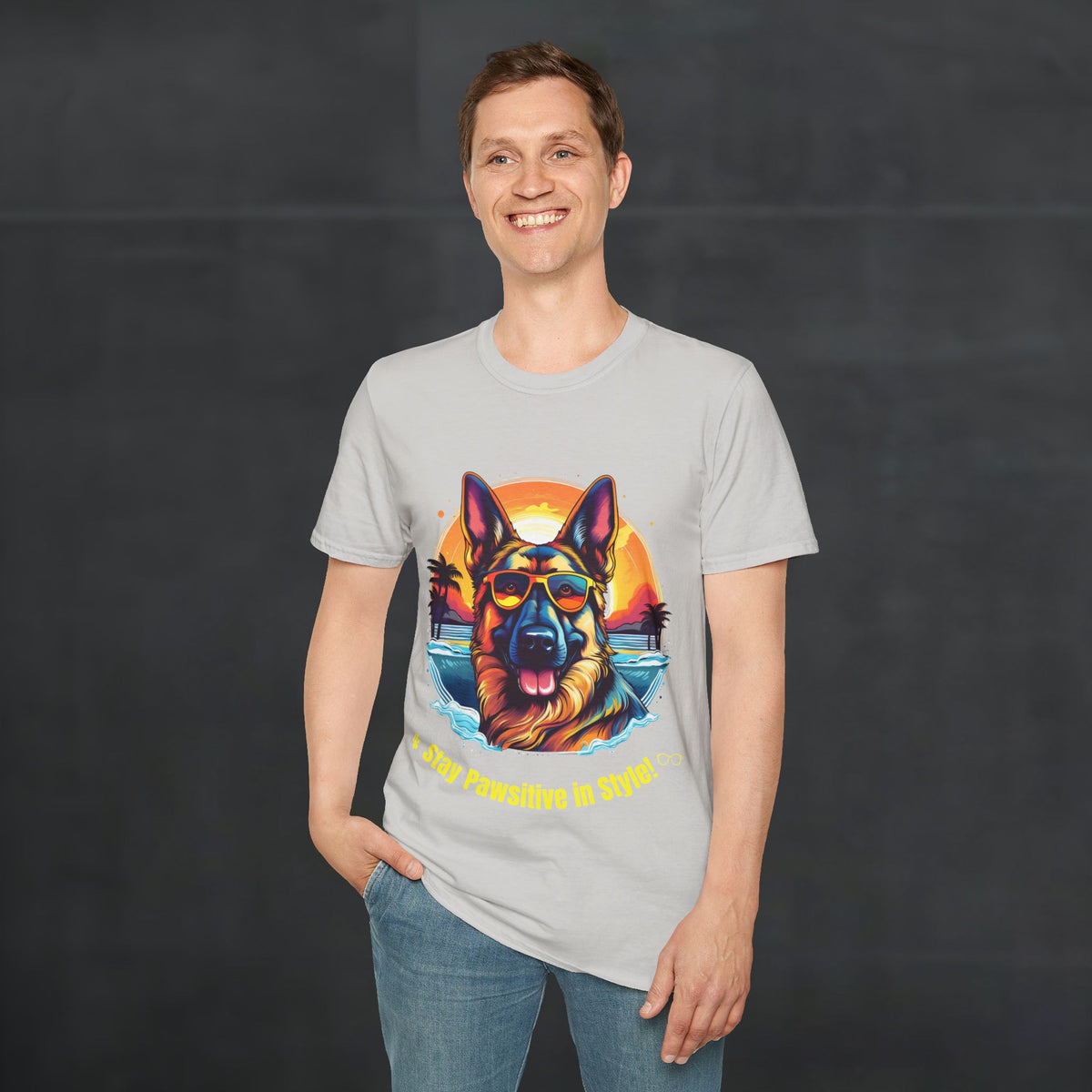 Male model wearing Ice Grey color German Shepherd “Stay Pawsitive in Style” T-shirt with colorful retro sunset beach dog graphic.