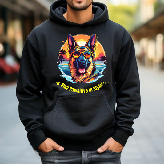 Man wearing a black Stay Pawsitive in Style hoodie with a German Shepherd graphic on an urban walkway