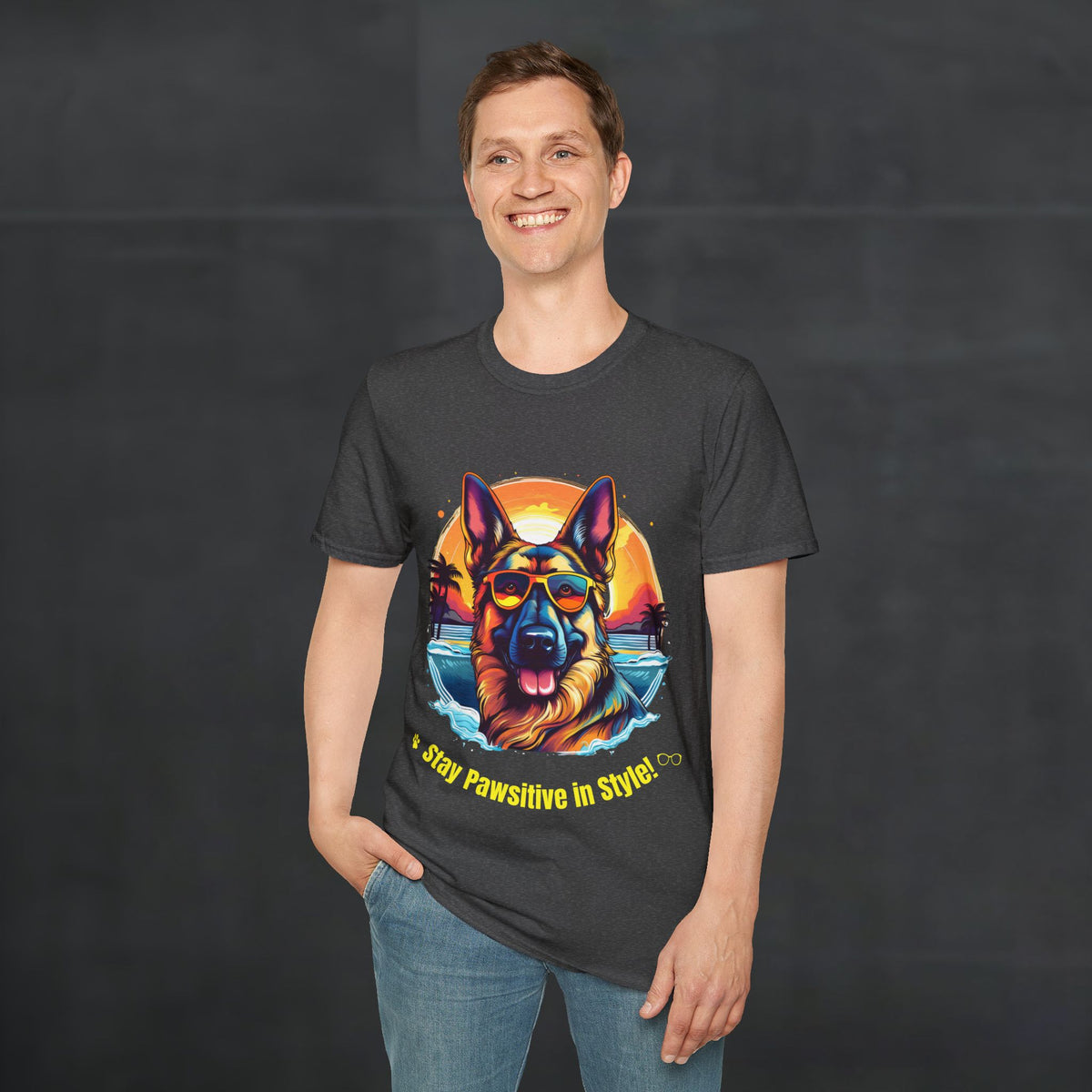 Man wearing a dark heather color Stay Pawsitive German Shepherd t-shirt with a German Shepherd graphic in a street lifestyle scene
