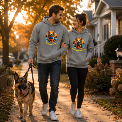 Steel Grey German Shepherd hoodie worn by a couple walking their dog outdoors during autumn.